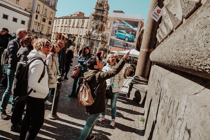 Naples: Veiled Christ & Santa Chiara Cloister Small Group Tour - Piazza San Gaetano and ancient city layers