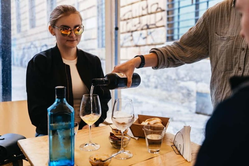 Palermo: Wine Tasting with Snacks at Bottega Monteleone - The red wine brings the regional discussion into focus
