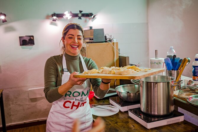 Pasta and Tiramisu Cooking Class Near the Colosseum - Making fettuccine from a ball of dough