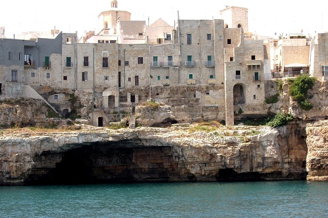 Polignano a Mare boat tour emotions, caves, diving and appetizers - The Polignano coastline and Lama Monachile