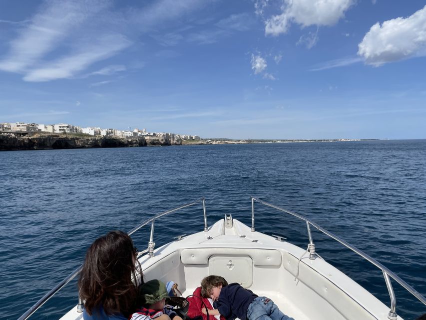 Polignano a Mare: Speedboat Cruise to Caves with Aperitif - Lama Monachile Beach from the water