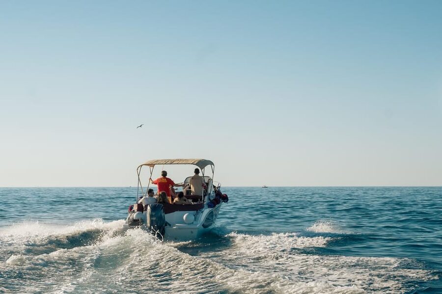 Polignano Sea Caves: Boat Tour with Snorkeling & Aperitif - Grotta delle Rondinelle shows the coast at work