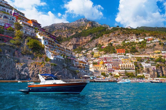 Positano & Amalfi Boat Tour from Naples with Light Lunch - Boarding the boat near Sorrento