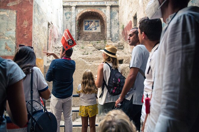 Priority Access Pompeii & Mt. Vesuvius Full day from Sorrento - Baths, shops, and ordinary Roman life