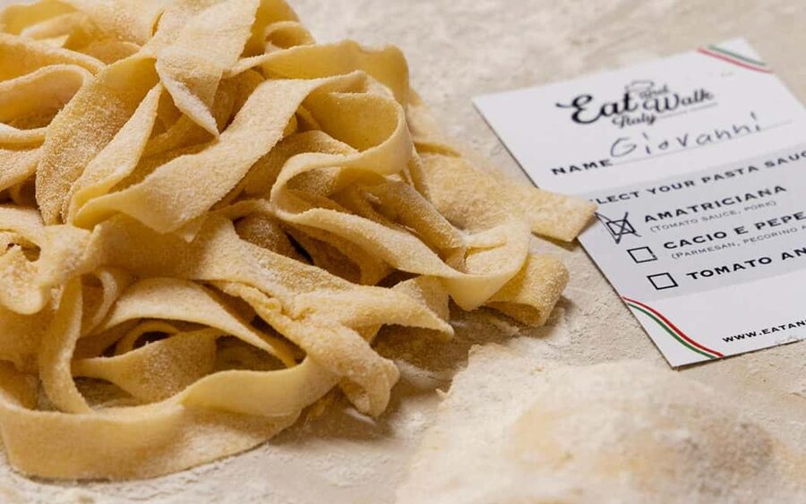 Rome: 3-in-1 Fettuccine, Ravioli, and Tiramisu Cooking Class - Cutting and cooking fettuccine