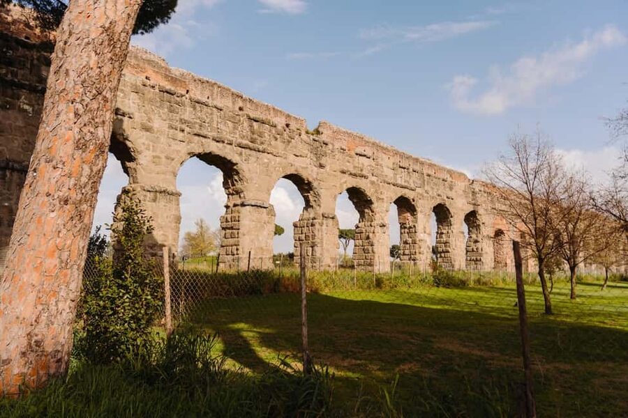 Rome: Appian Way, Aqueducts, and Catacombs Tour - The vehicle and the road between sites