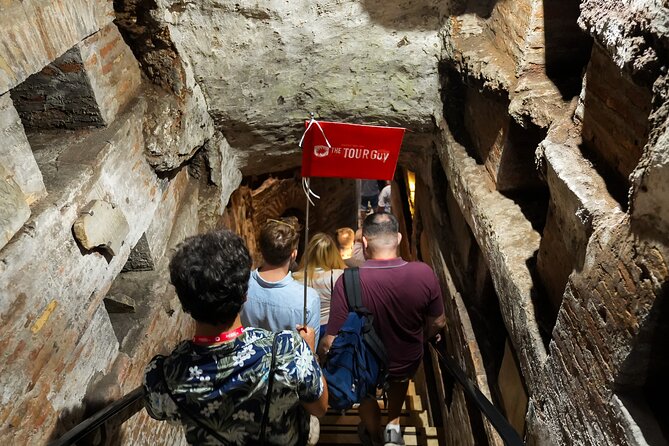 Rome Catacombs & Capuchin Crypts VIP Group Tour with Transfers - Walking through the Catacombs of St. Callixtus