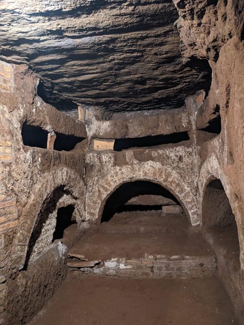 Rome: Catacombs Skip-the-Line Tour with Tickets - Early Christian artwork in an underground setting