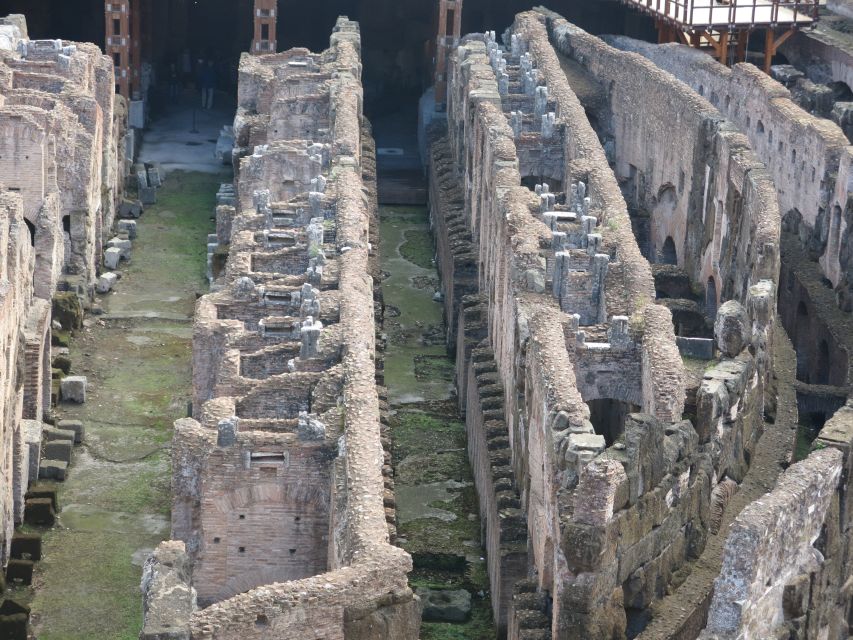 Rome: Colosseum Arena Floor, Roman Forum & Palatine Tour - A quick look at the Arch of Constantine