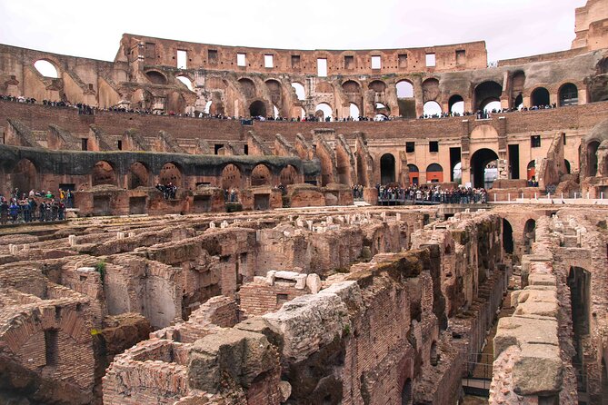 Rome: Colosseum, Forum, and Palatine Hill 3 hr Tour - Entering the Colosseum after the long queues