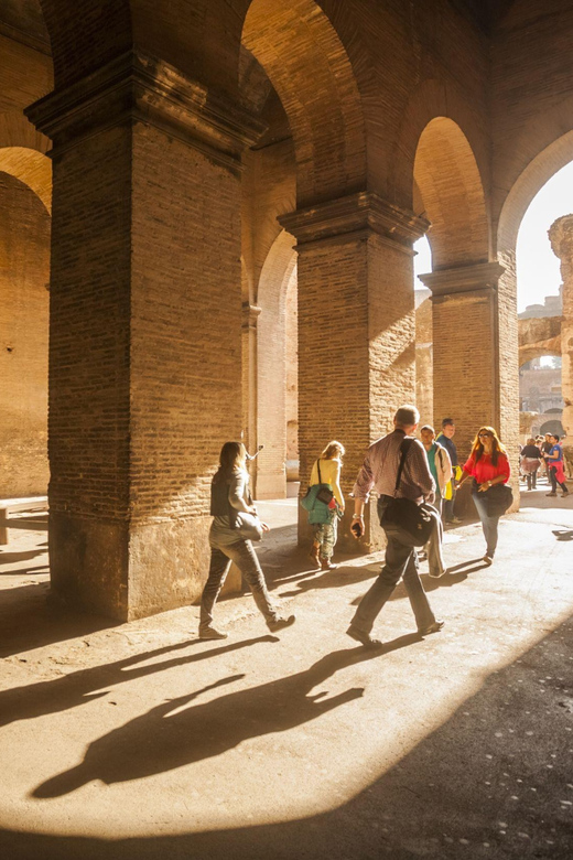 Rome: Colosseum, Forum, Palatine Hill Entry & Audioguide App - Walking through the Roman Forum