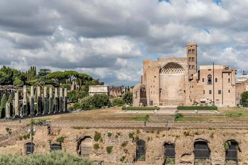 Rome: Colosseum & Forum Small Group Tour with Palatine Hill - Entering the Colosseum’s first and second tiers