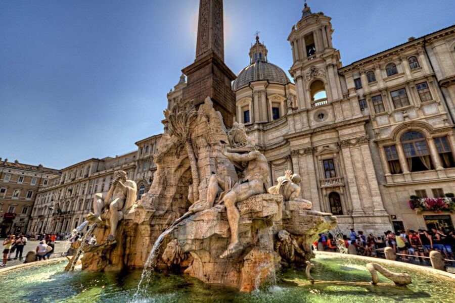 Rome: Colosseum & Forum Small Group Tour with Palatine Hill - Walking through the Roman Forum