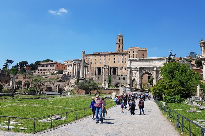 Rome: Colosseum, Palatine Hill and Roman Forum Guided Tour - The Arch of Titus and the Forum approach