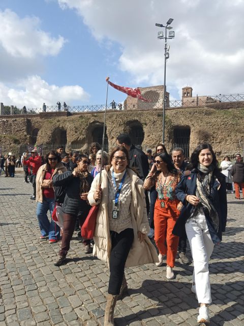 Rome: Colosseum, Palatine Hill, & Roman Forum Walking Tour - Entering the Colosseum’s first and second levels