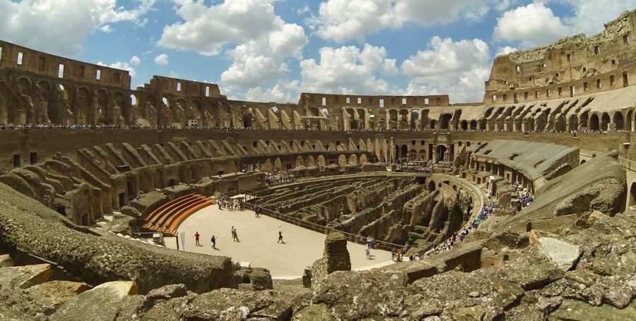 Rome: Colosseum, Roman Forum, and Palatine Hill Tour - Walking into the Roman Forum