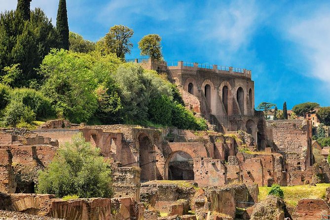 Rome: Colosseum, Roman Forum & Palatine Hill Visit + Audio Guide - Walking through the Roman Forum
