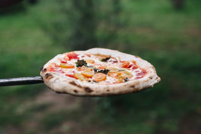 Rome Cooking Class: Make Pizza and Pasta with Wine & Dessert - Your pizza goes into the wood-fired oven