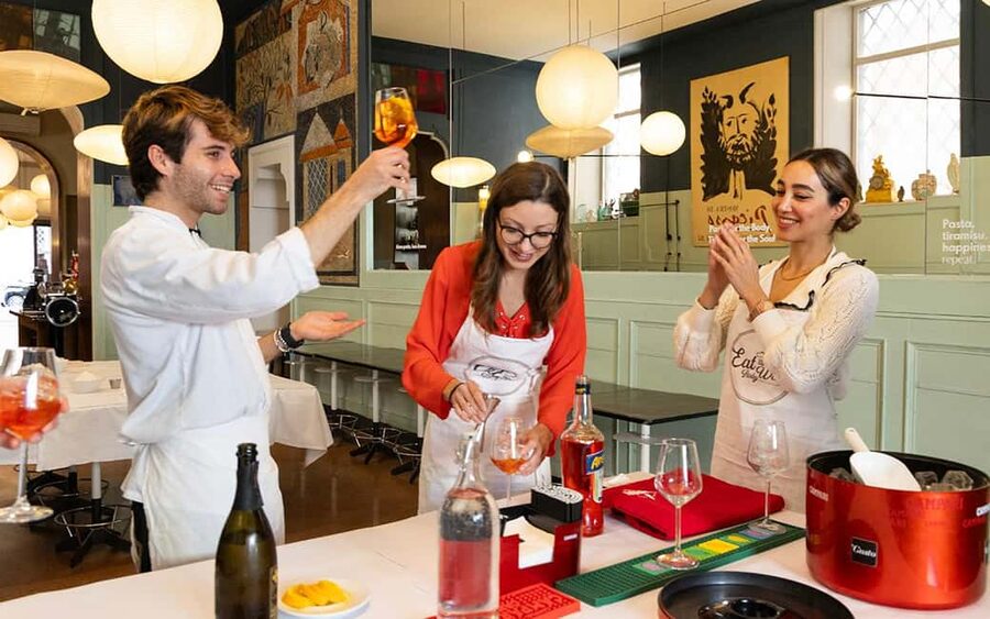 Rome: Enjoy Spritz and Pasta Making in Piazza Navona - Turning dough into fettuccine and maltagliati