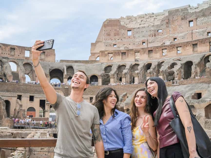 Rome: Full-Day Colosseum, Vatican Museums & City Center Tour - Entering the Colosseum after the city walk