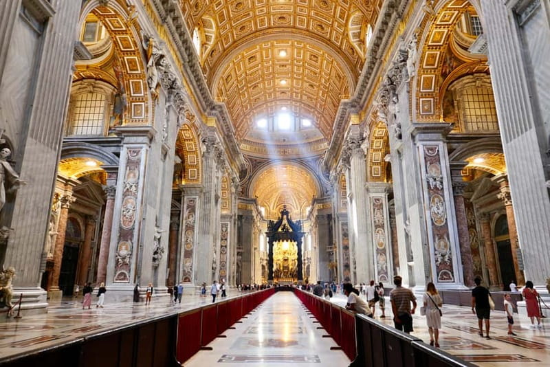 Rome: Guided Tour of St. Peter's Basilica, Grottoes & Square - Entering the Basilica after security