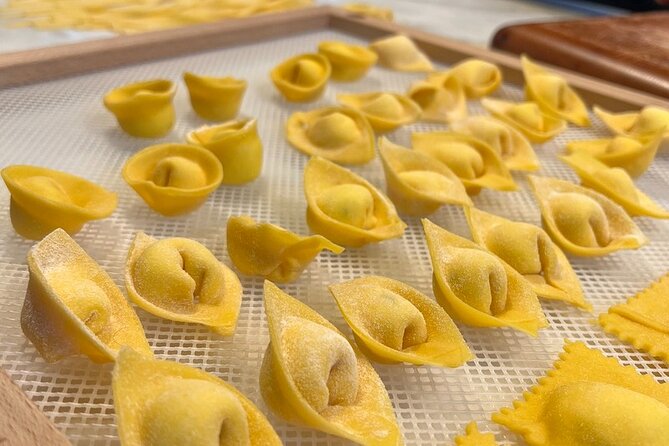 Rome Pasta Making Class with Italian Sauces and Wine Included - Making dough, rolling pasta, and shaping ravioli