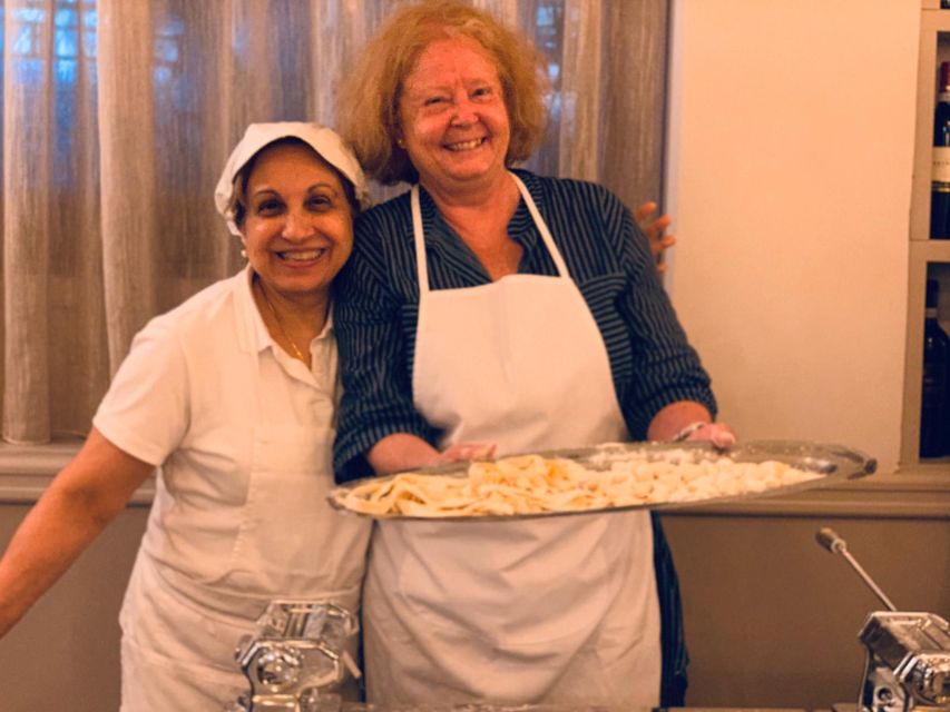 Rome: Pasta & Tiramisu Class with Free Flowing Fine Wine - Sitting down for the three-course meal