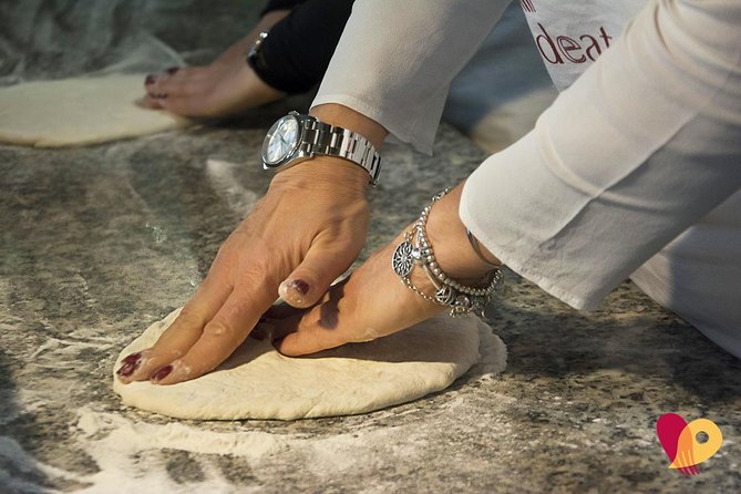 Rome: Pizza Making Class Small Group Experience - Spritz, chips, and a proper Roman welcome