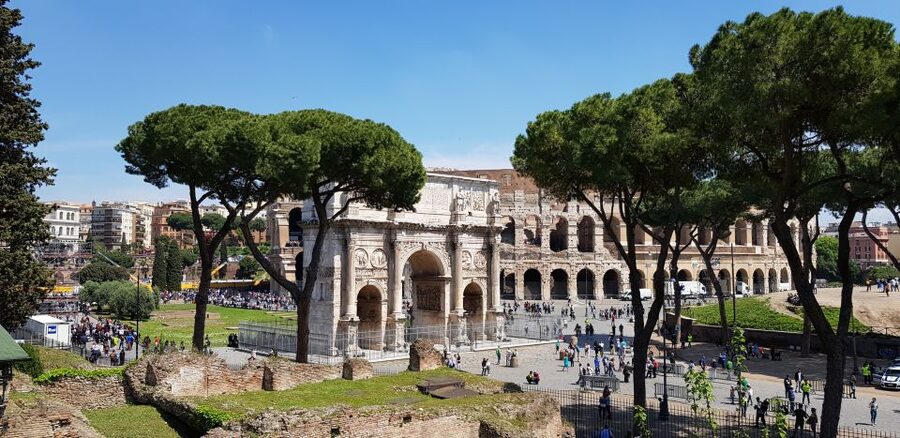 Rome: Small-Group Colosseum, Roman Forum & Palatine Hill - Walking through the Roman Forum