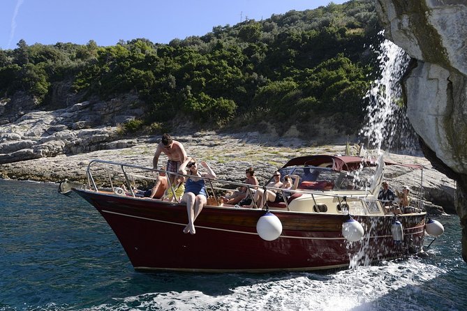 Small Group Boat Tour Capri & Blue Grotto with Swimming Stops - Cala di Mitigliano and the waterfall