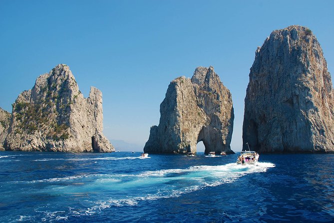 Small Group Boat Tour Capri & Blue Grotto with Swimming Stops - Two swimming stops and a casual lunch