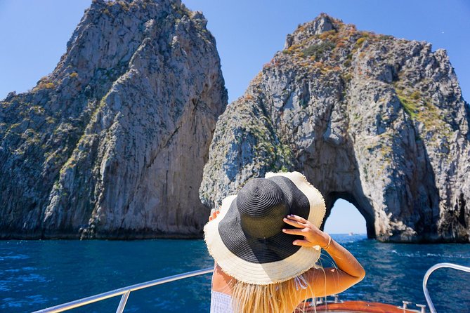 Small Group Boat Tour Capri & Blue Grotto with Swimming Stops - Along the Sorrento coast toward Capri