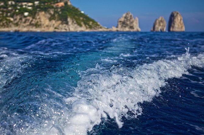 Small Group Capri Island Boat Ride with Swimming and Limoncello - The Faraglioni Stop and Time in the Water