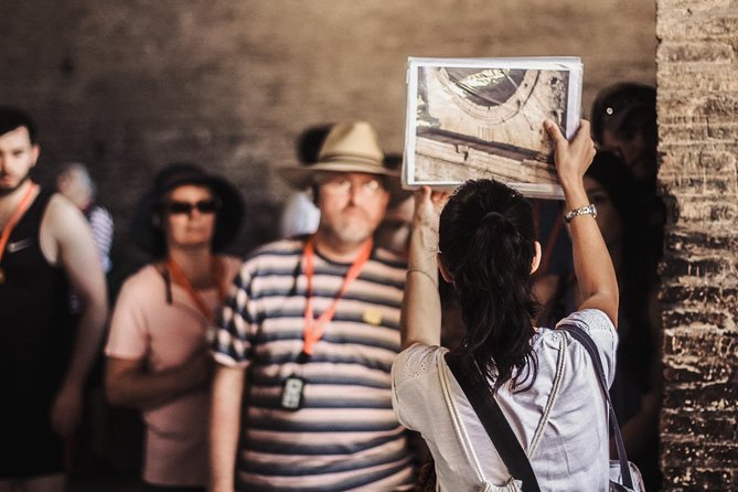Small-Group Colosseum Tour with Roman Forum & Palatine Hill - Entering the Colosseum’s first and second tiers