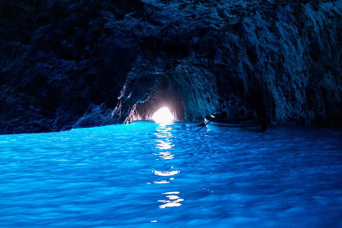 Small Group Tour from Naples to Blue Grotto, Anacapri and Capri - Entering the Blue Grotto by tiny rowboat