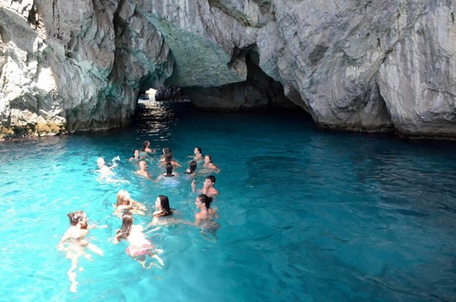 Sorrento: Capri and Blue Grotto Boat Cruise with Drinks - Circling Capri and its famous caves