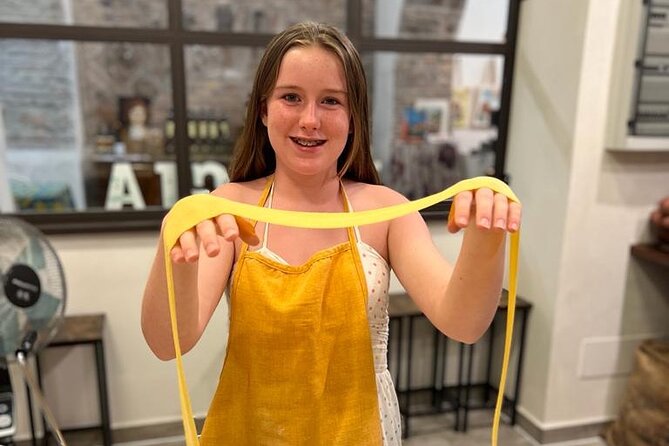 Super Fun Pasta & Gelato Class by Vatican with Wine + Oil Tasting - Making pasta with your hands and a rolling pin