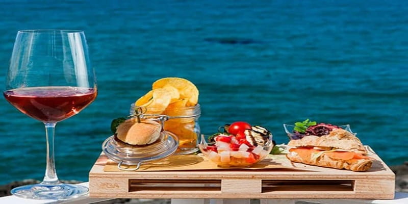 Taormina: Boat Tour with Aperitif on Isola Bella - Entering Taormina’s Blue Cave