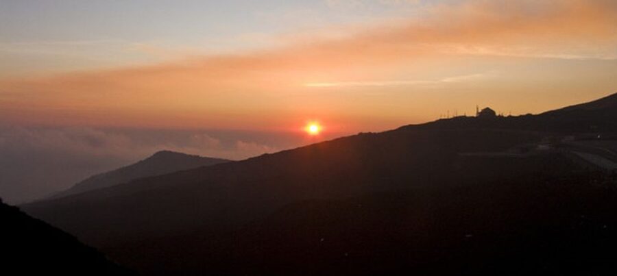 Taormina: Mount Etna Sunset Tour with Cave Visit and Tasting - Tasting honey and Sicilian produce