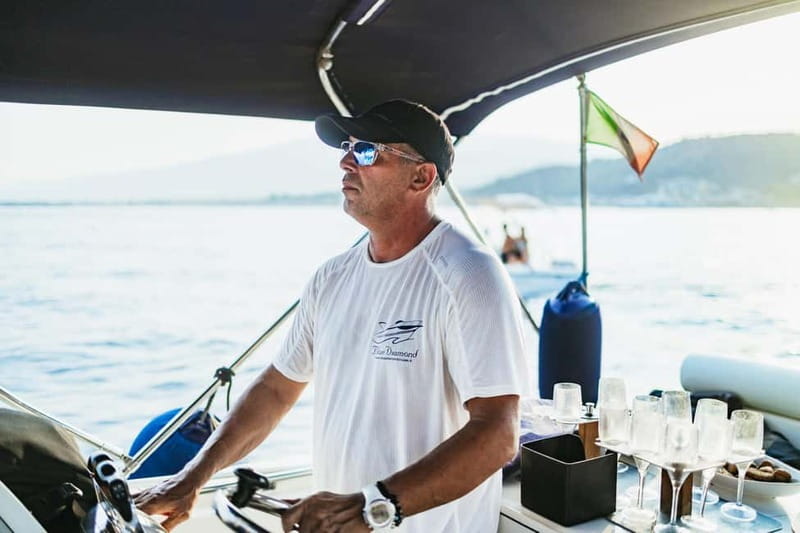 Taormina: Sunset Boat Tour with Dolphin Watching & Aperitif - Swimming and Snorkeling Near Isola Bella