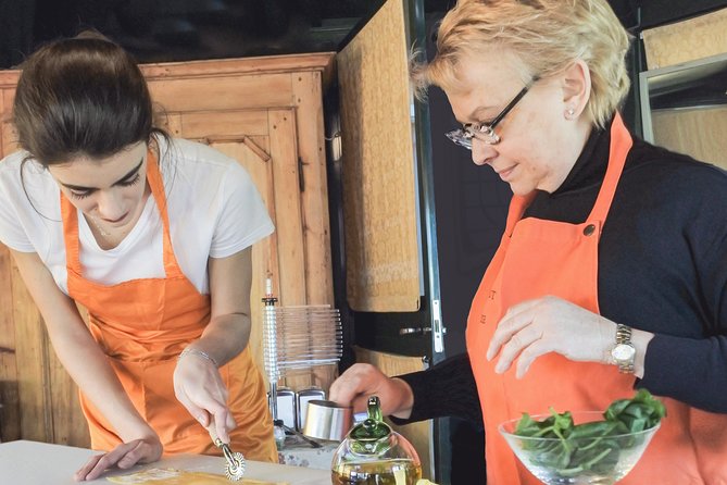 The Secrets to Learn Fresh Pasta and Tiramisù in a Glam Home - Making tagliatelle with traditional tomato sauce