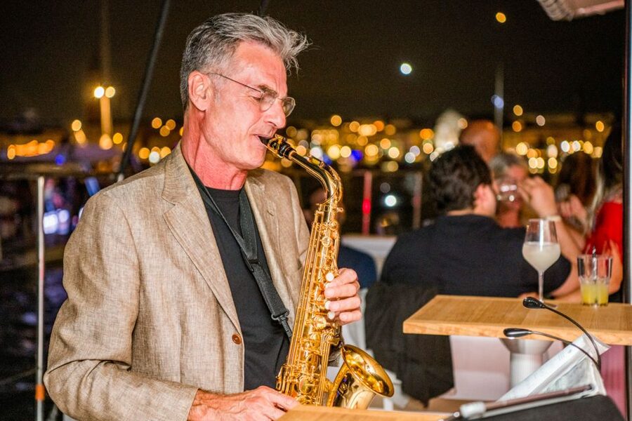 Venice: Catamaran Sunset Jazz Cruise with Aperitivo - Boarding a spacious boat with several ways to sit