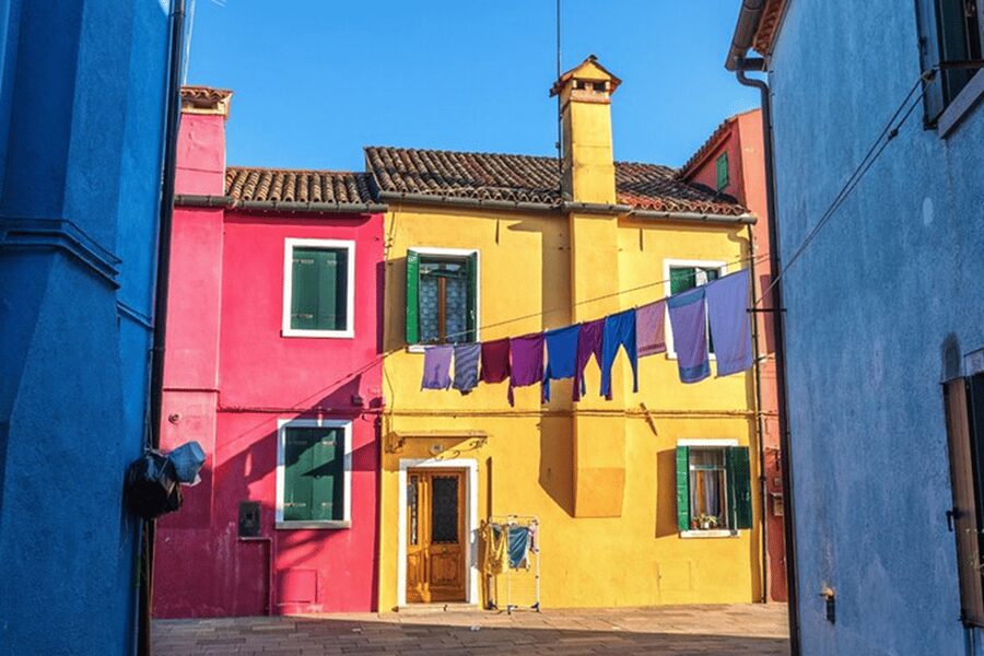 Venice Islands: Murano Glass & Burano Colors Guided Visit - The boat to Burano and its colorful streets