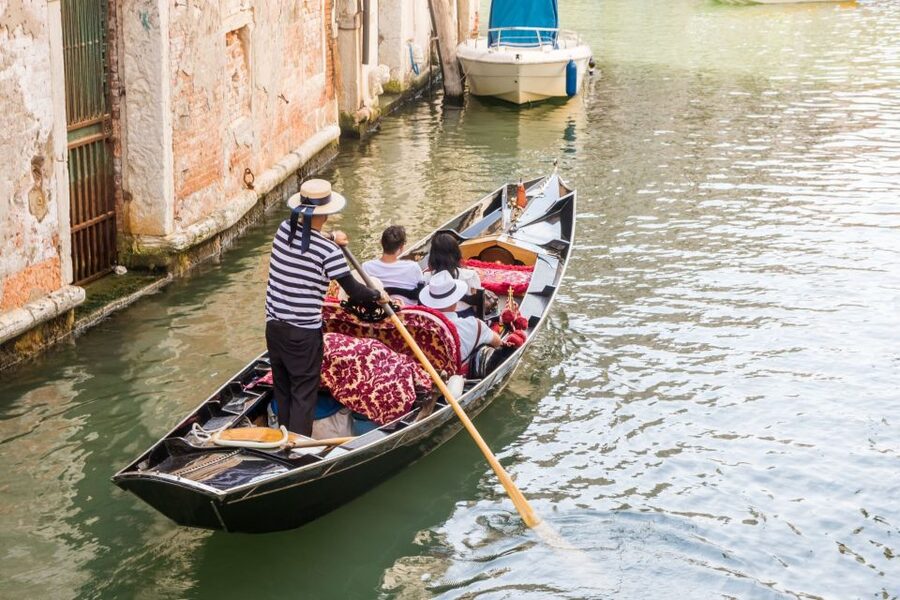 Venice: Private Gondola Cruise for up to 5 Passengers - Leaving the dock and entering Venice by water