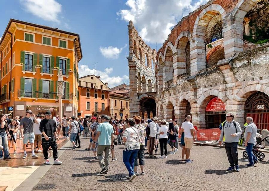 Verona: City Walking Tour with Cable Car & Wine Aperitif - Roman arches and the old city gates
