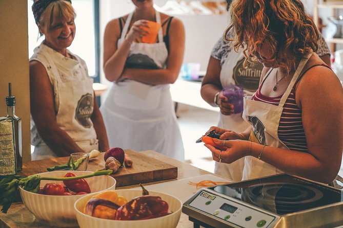 Verona: Italian Cooking Class with Pasta, Risotto and Tiramisù - Sitting down to eat your own Verona lunch